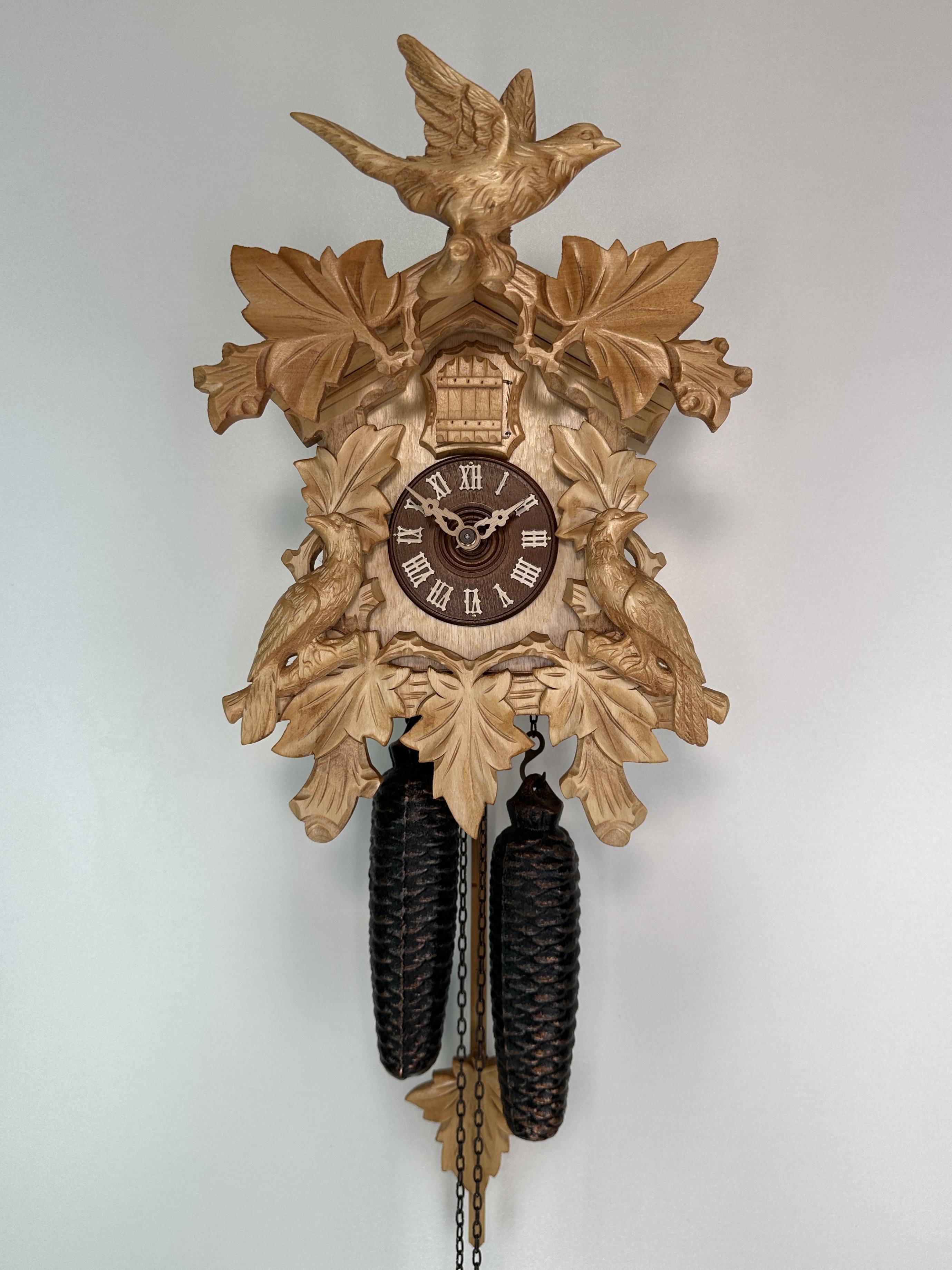 8 Days Cuckoo Clock with cuckoo pair and vine leaves and bird 
