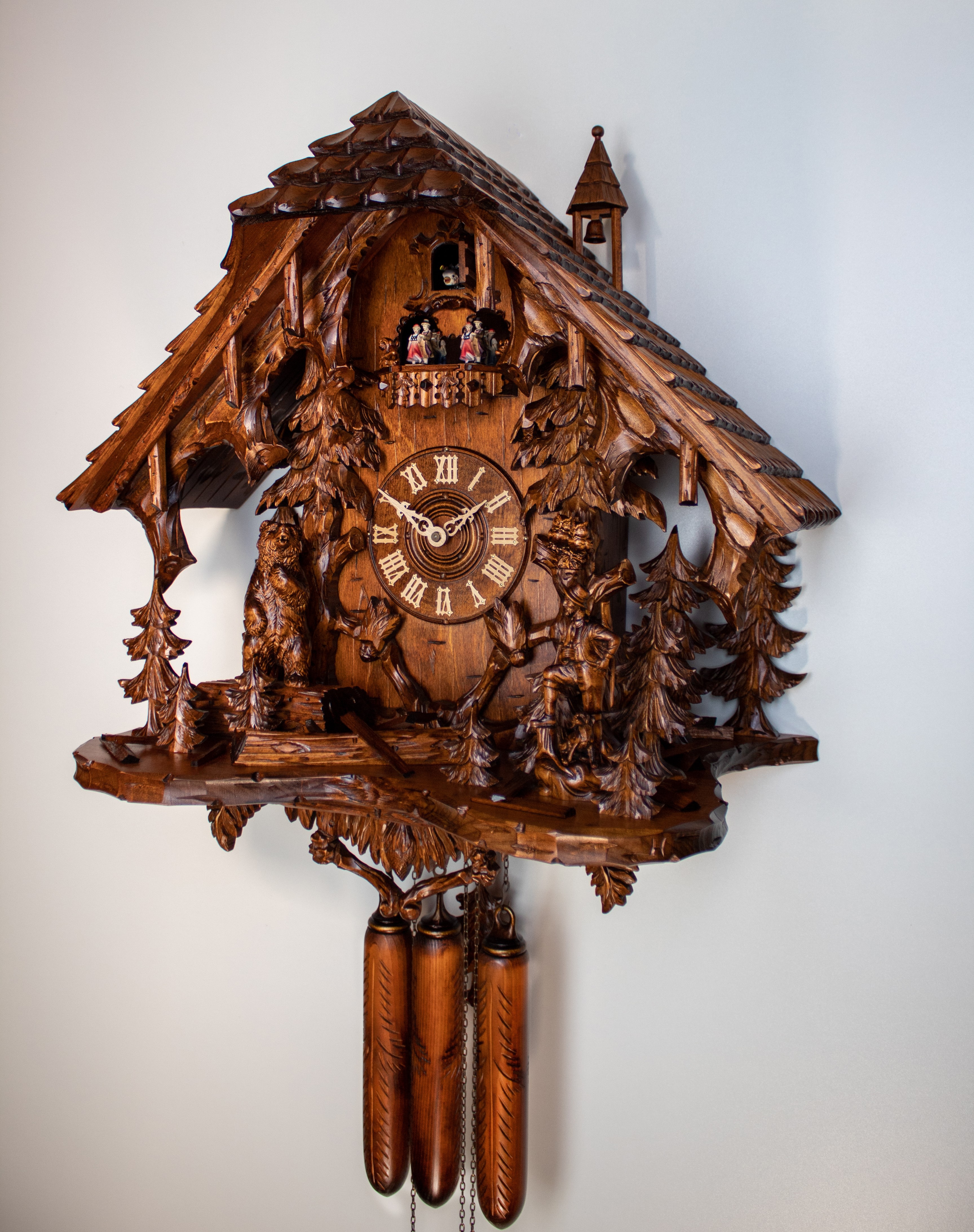 8 Days Music Dancer  Cuckoo Clock with forest scene, hunter and bear
