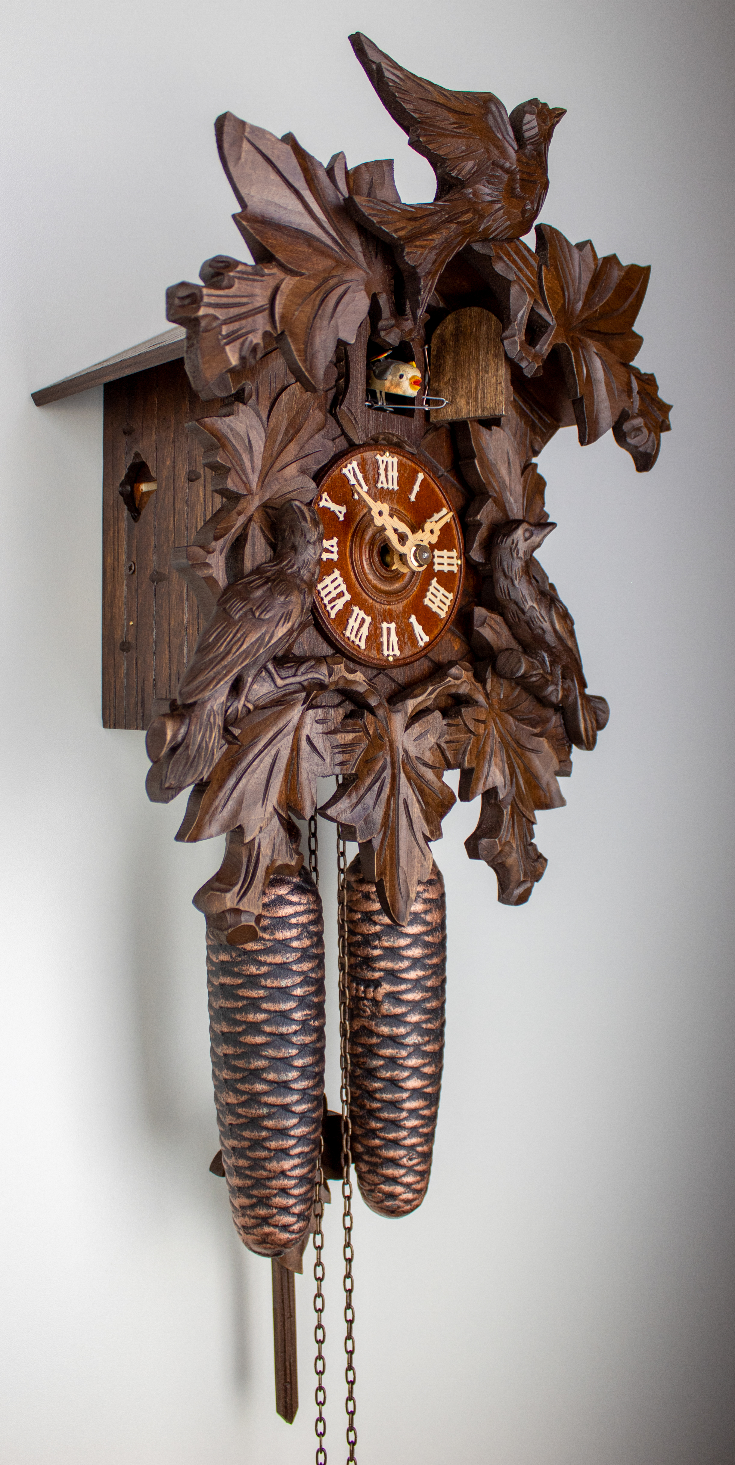 8 Days Cuckoo Clock with cuckoo pair and vine leaves and bird