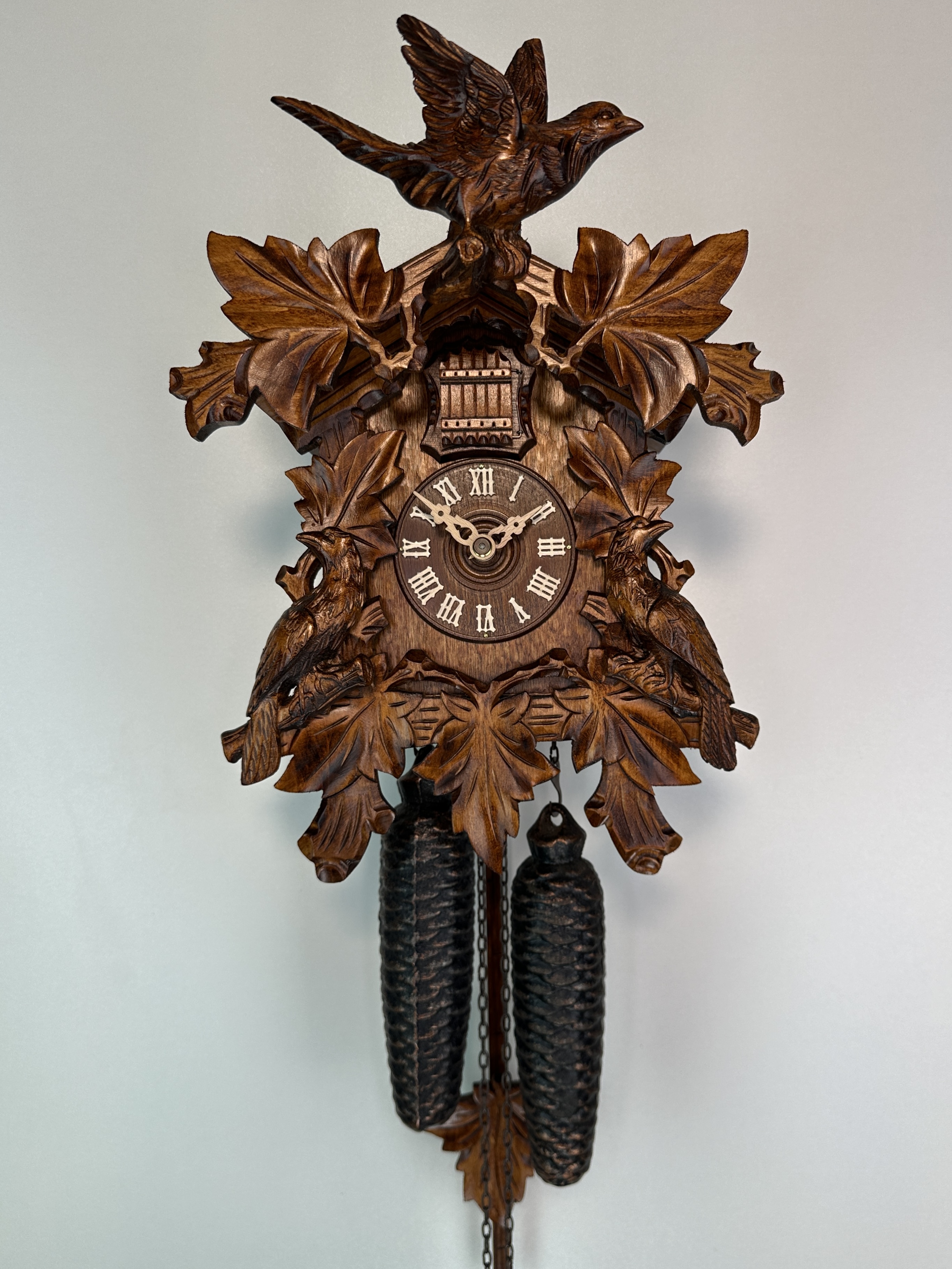 8 Days Cuckoo Clock with cuckoo pair and vine leaves and bird