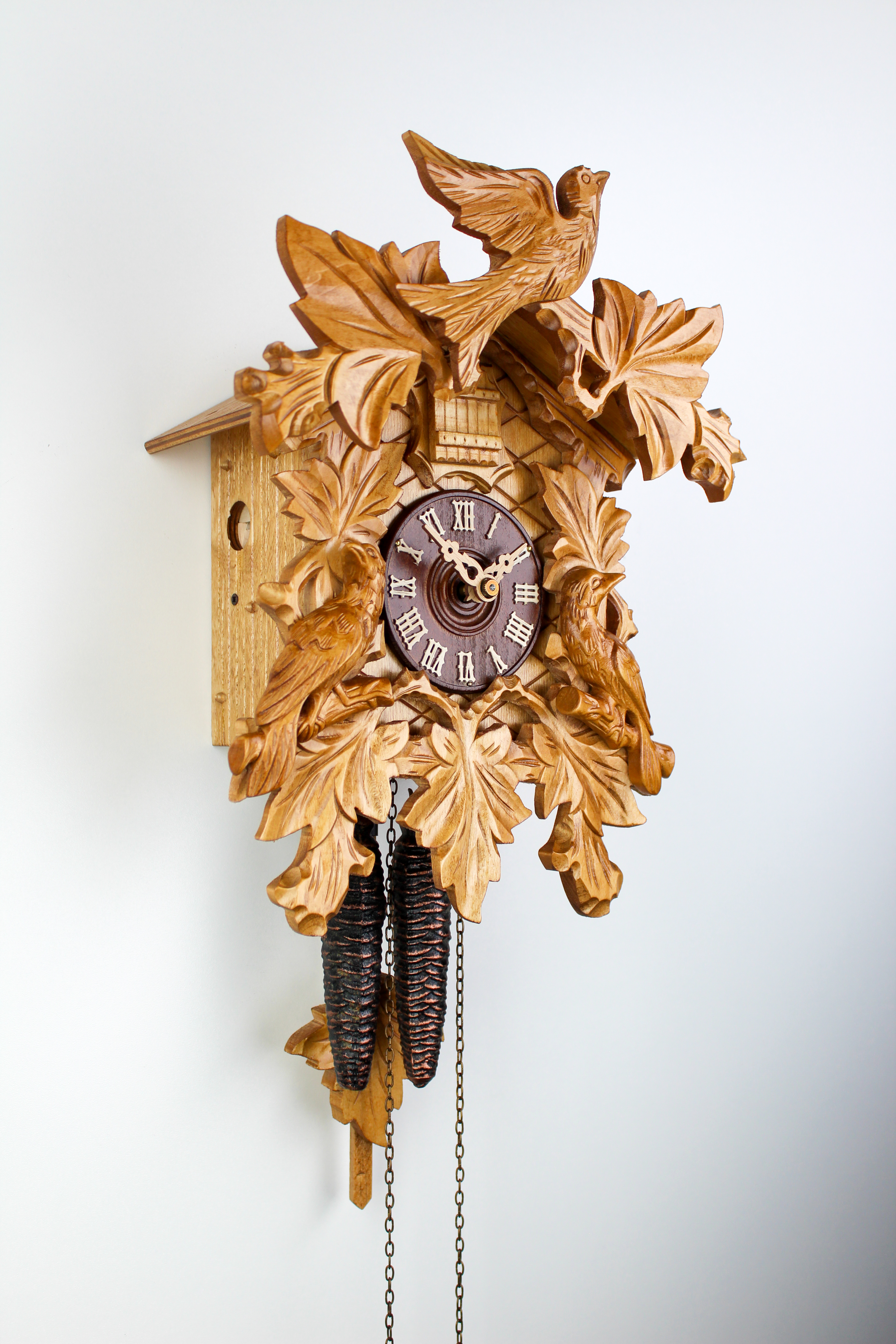 1 Day Cuckoo Clock vine leaves with cuckoo family and bird