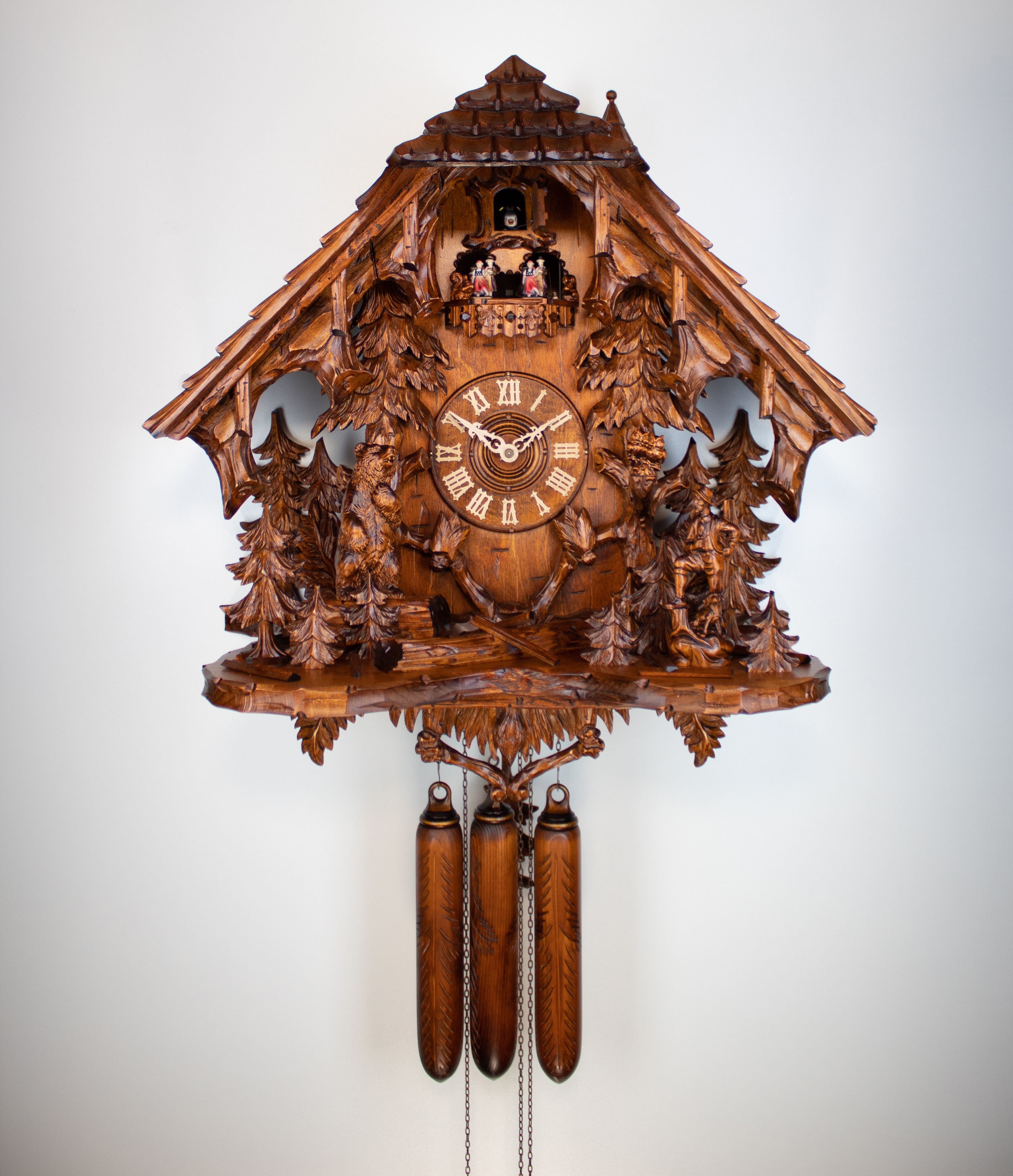 8 Days Music Dancer  Cuckoo Clock with forest scene, hunter and bear